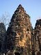 Cambodia: The face of Jayavarman VII on the South Gate, Angkor Thom