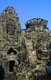 The Bayon was originally the official state temple of the Mahayana Buddhist King Jayavarman VII. The Bayon, at the centre of Angkor Thom (Great City), was established in the 12th century by King Jayavarman VII.<br/><br/>

Angkor Thom, meaning ‘The Great City’, is located one mile north of Angkor Wat. It was built in the late 12th century CE by King Jayavarman VII, and covers an area of 9 km², within which are located several monuments from earlier eras as well as those established by Jayavarman and his successors. It is believed to have sustained a population of 80,000-150,000 people.<br/><br/>

At the centre of the city is Jayavarman's state temple, the Bayon, with the other major sites clustered around the Victory Square immediately to the north.<br/><br/>

Angkor Thom was established as the capital of Jayavarman VII's empire, and was the centre of his massive building programme. One inscription found in the city refers to Jayavarman as the groom and the city as his bride.<br/><br/>

Angkor Thom seems not to be the first Khmer capital on the site, however, as Yasodharapura, dating from three centuries earlier, was centred slightly further northwest.<br/><br/>

The last temple known to have been constructed in Angkor Thom was Mangalartha, which was dedicated in 1295. In the following centuries Angkor Thom remained the capital of a kingdom in decline until it was abandoned some time prior to 1609. 