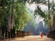 Cambodia: A monk walks towards the western gopura, Preah Khan, Angkor